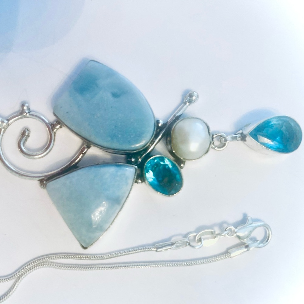 3 inch, Owyhee Opal, Blue Topaz, and Pearl pendant on a silver chain. - Picture 4 of 5